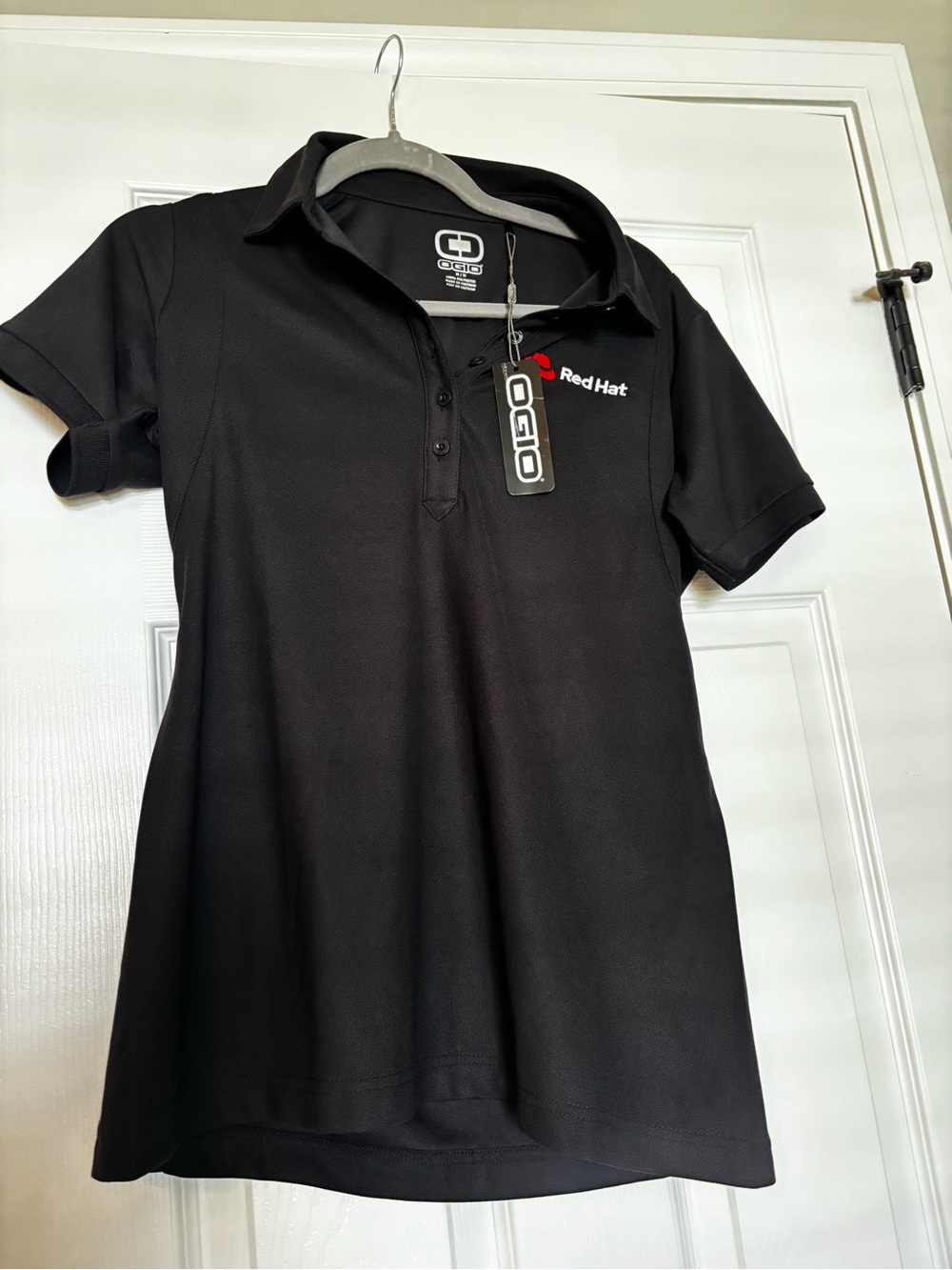 OGIO Women's Black Polo with Red Heart Red Hat Embroidery